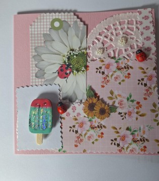 Rosa kort med turkis ispinne på